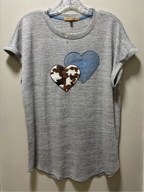 Woman’s medium My Danielle gray short sleeve top features double-heart graphic